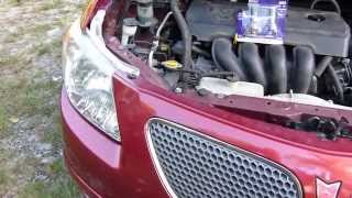 Pontiac Vibe Headlight Bulb Replacement Highlights [upl. by Odidnac]