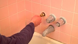 Fixing a Dripping Shower Head changing faucet valve washer [upl. by Hump]