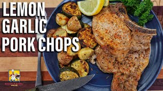 Oven Baked Lemon Garlic Pork Chops  Simple Recipe [upl. by Aynam]