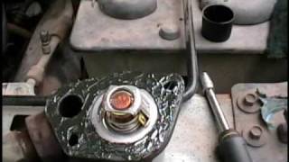 1992 Ford F150 Pickup thermostat replacement [upl. by Ala161]