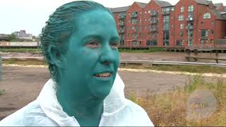 Thousands strip off and get painted blue for Spencer Tunick artwork [upl. by Yarb]