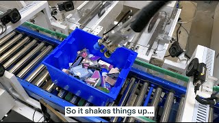 Covariant robot moves items for better picking [upl. by Alliuqahs25]