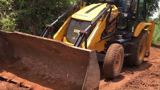 jcb 3dx digging soil and levelling land for making new road [upl. by Eikcim]