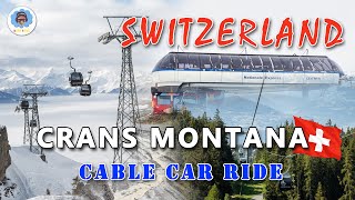 Switzerland  CransMontana Cable Car Ride in the Snow [upl. by Kcinimod]