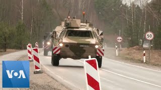 Hundreds of German Soldiers Military Vehicles Arrive at Lithuanian NATO Base [upl. by Donavon]