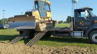 John Deere 650J Dozer Tricky Unload From Truck [upl. by Latsryc]