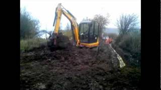 JCB Mini Digger Backfilling Trench Part 2 [upl. by Adnak427]