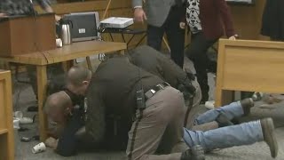 Father of victims lunges at Larry Nassar in court [upl. by Yebba]