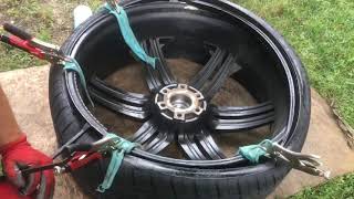 Mounting a 28 Inch Tire Manually [upl. by Lainahtan]