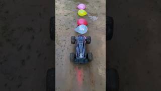 JLB CHEETAH RC CAR vs Water Balloon [upl. by Ainat]