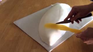 How to Make a Fish Shaped Cake Part 2 Covering the Cake with Rolled Fondant [upl. by Jarietta]