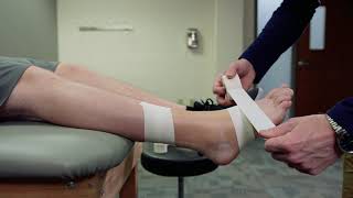 Achilles Tendon Taping Skills Video [upl. by Anelram757]