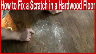 how to fix a scratch in a hardwood floor [upl. by Hanas54]