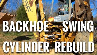 How To Rebuild Backhoe Swing Cylinder  Ford New Holland 555E [upl. by Kleon]