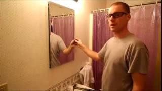 Mounting a recessed medicine cabinet mirror [upl. by Aronow]