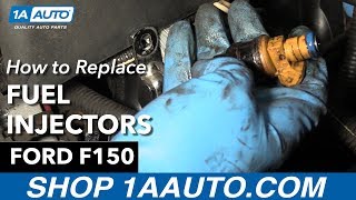 How To Replace Fuel Injectors 9704 Ford F150 [upl. by Lilac290]