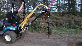 Ls mt122 handling county line post hole digger with 12” auger [upl. by Ros]