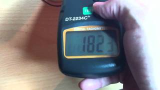 Measuring fan speed with handheld digital tachometer [upl. by Ennazus]