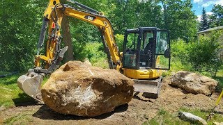 Caterpillar 3055e2 Moving Large Boulder [upl. by Suciram281]