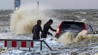 Spectacular tidal bore surges up Germany streets Hamburg Hormersel Hamburger [upl. by Nylirad]