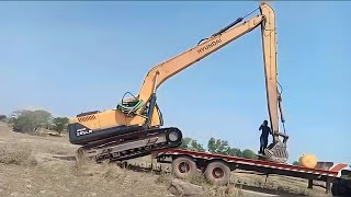 Poclain machine loading on trailer long boom excavator [upl. by Collier446]