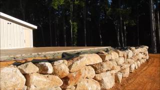 Building A Rock Retaining Wall [upl. by Peonir]