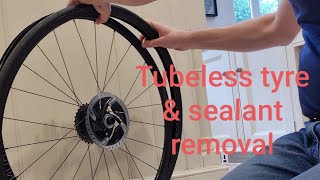 Removing tubeless bicycle tyres taking out sealant the clean way [upl. by Quinta]