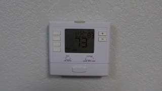 Program Your T705 Programmable Thermostat [upl. by Stanwinn]