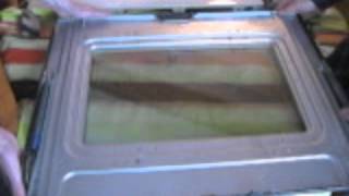 How to Take Apart an Oven Door to Clean the Glass [upl. by Ahsatsana224]