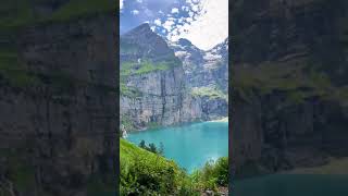 Oeschinen Lake is a popular destination for hiking fishing and boating and is known for its crys [upl. by Frohman8]