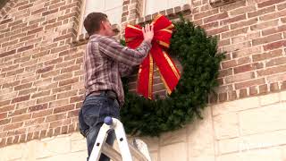 Hanging a Christmas Wreath on Brick  Pro Installation Tips  Christmas Designers [upl. by Gimble]