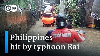 100000 evacuated as Super Typhoon Rai makes landfall in the Philippines  DW News [upl. by Betthezel]