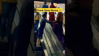 Escalator Prank Gone Wrong 🥹  shorts prank random funny escalator reactionvideo [upl. by Eberta]