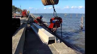 Vibro Hammer Installation ShoreGuard® Vinyl Sheet Piling Seawall by CMI [upl. by Einot]