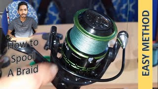 How to put Braided Line on a Spinning fishing reel  Best and Easy method  No more wind knots [upl. by Ssur483]