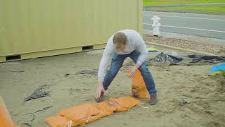 How to fill sandbags for flooding [upl. by Sirad581]