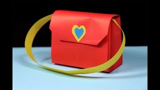 How to make a paper handbag  Easy origami handbag tutorial [upl. by Jon]