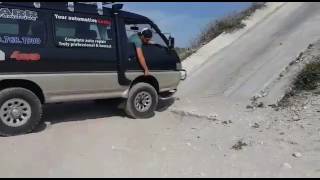 Mitsubishi Delica L300 climbing a steep cement grade [upl. by Clive]