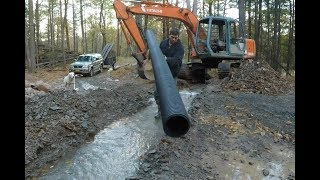 Installing culvert pipes [upl. by Barty]