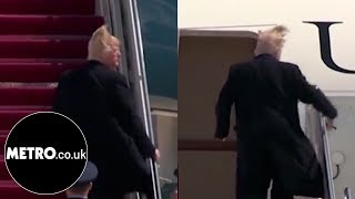 Donald Trumps hair attempting to fly off as he boards Air Force One  Metrocouk [upl. by Ennovahs]