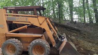 Moving gravel with the Case 1845c skid steer [upl. by Trepur457]