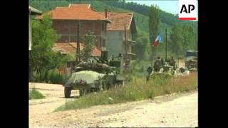 KOSOVO YUGOSLAV ARMY MOVING OUT OF PROVINCE [upl. by Gratiana]