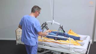 Guldmann Sling Instruction Repositioning sling  Moving patient in bed [upl. by Milstone344]