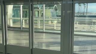 Orlando International Airport Bombardier Gates 7099 Tram arriving Terminal AB [upl. by Chilt]