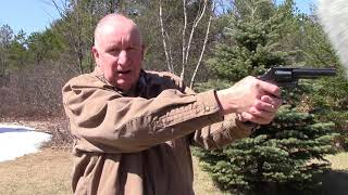 How to Shoot Double Action  A Police Expert Explains [upl. by Alveta]