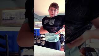 How to put shoulder pads on football [upl. by Forest]