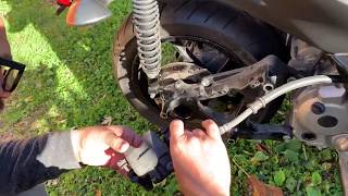 How To Remove The Rear Wheel Of A Yamaha X Max 300 [upl. by Idmann]