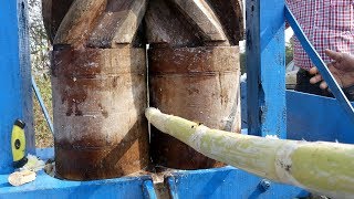 Wooden Crushed Sugarcane Juice  Sugarcane Juice Freshly Made the Ancient Way  Oldest Streetfood [upl. by Elvin]