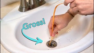 How to Clean a Clogged Sink amp Remove Stopper [upl. by Nyllij115]