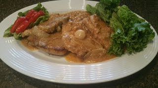 OVEN BAKED SMOTHERED PORK CHOPS [upl. by Buote534]